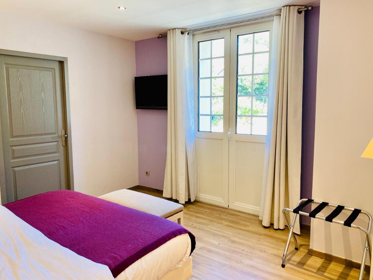 Logis Du Champ De Mars Hotel Puy-Saint-Martin Bagian luar foto