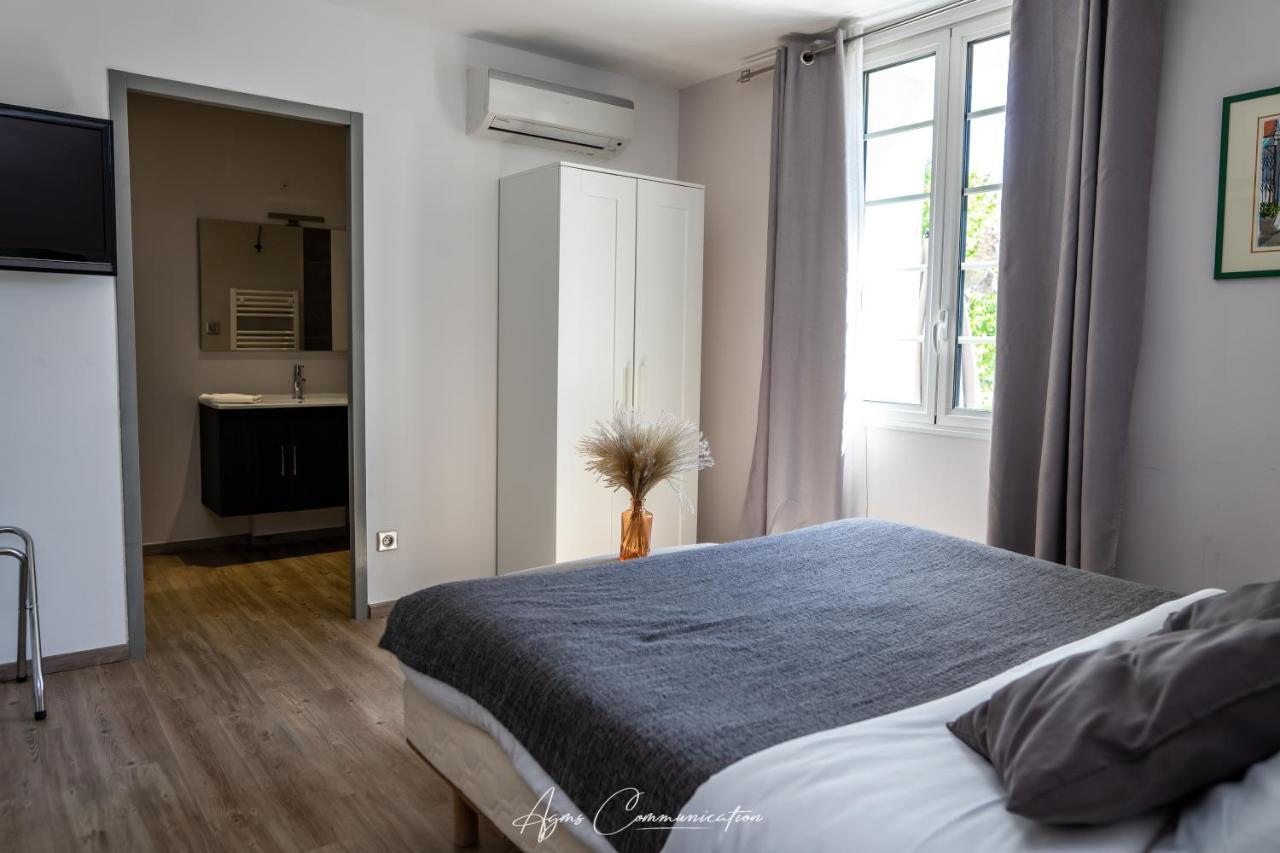 Logis Du Champ De Mars Hotel Puy-Saint-Martin Bagian luar foto