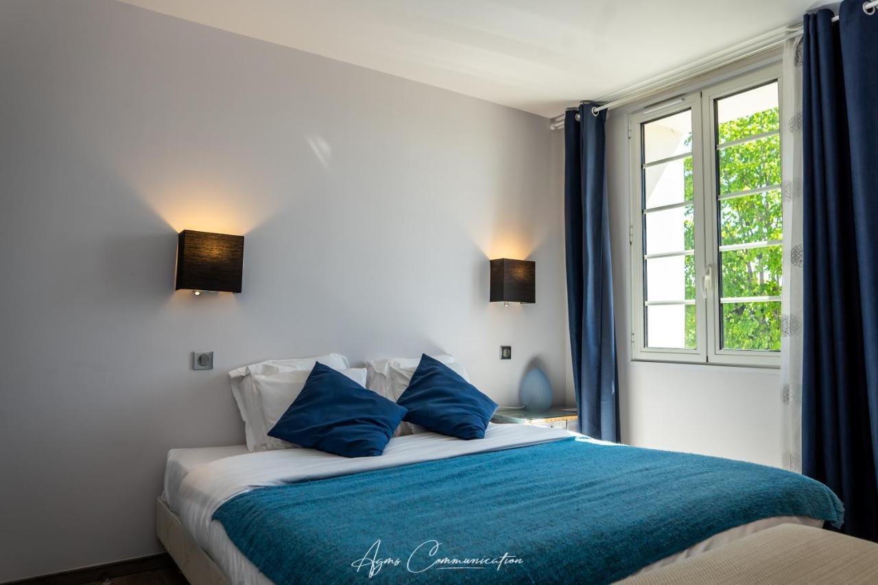 Logis Du Champ De Mars Hotel Puy-Saint-Martin Bagian luar foto