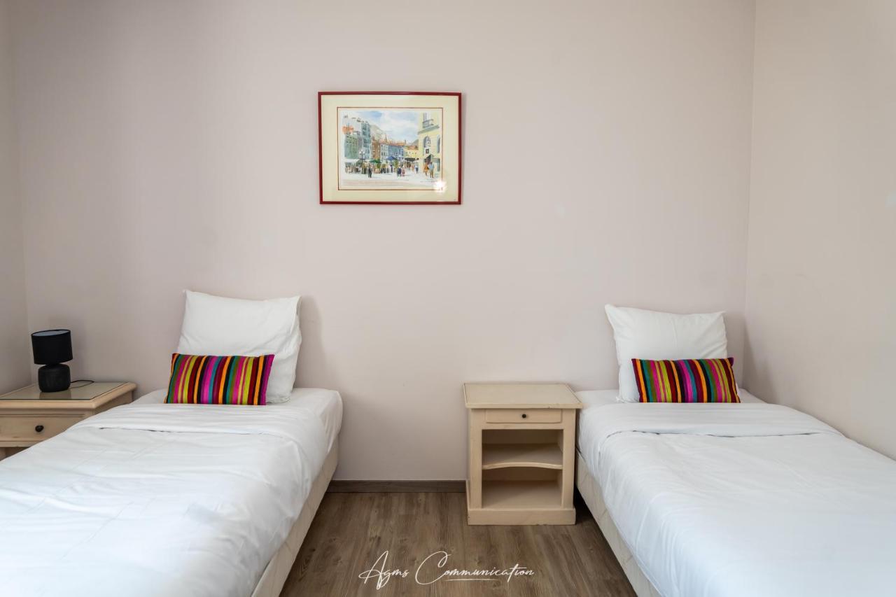 Logis Du Champ De Mars Hotel Puy-Saint-Martin Bagian luar foto